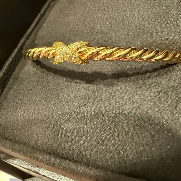 18m Gold Plated Twisted Bracelet with Simulated Diamond X Accents .